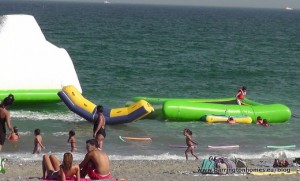 Inflatables in the sea in Sabinillas, Manilva, Costa del Sol, Spain